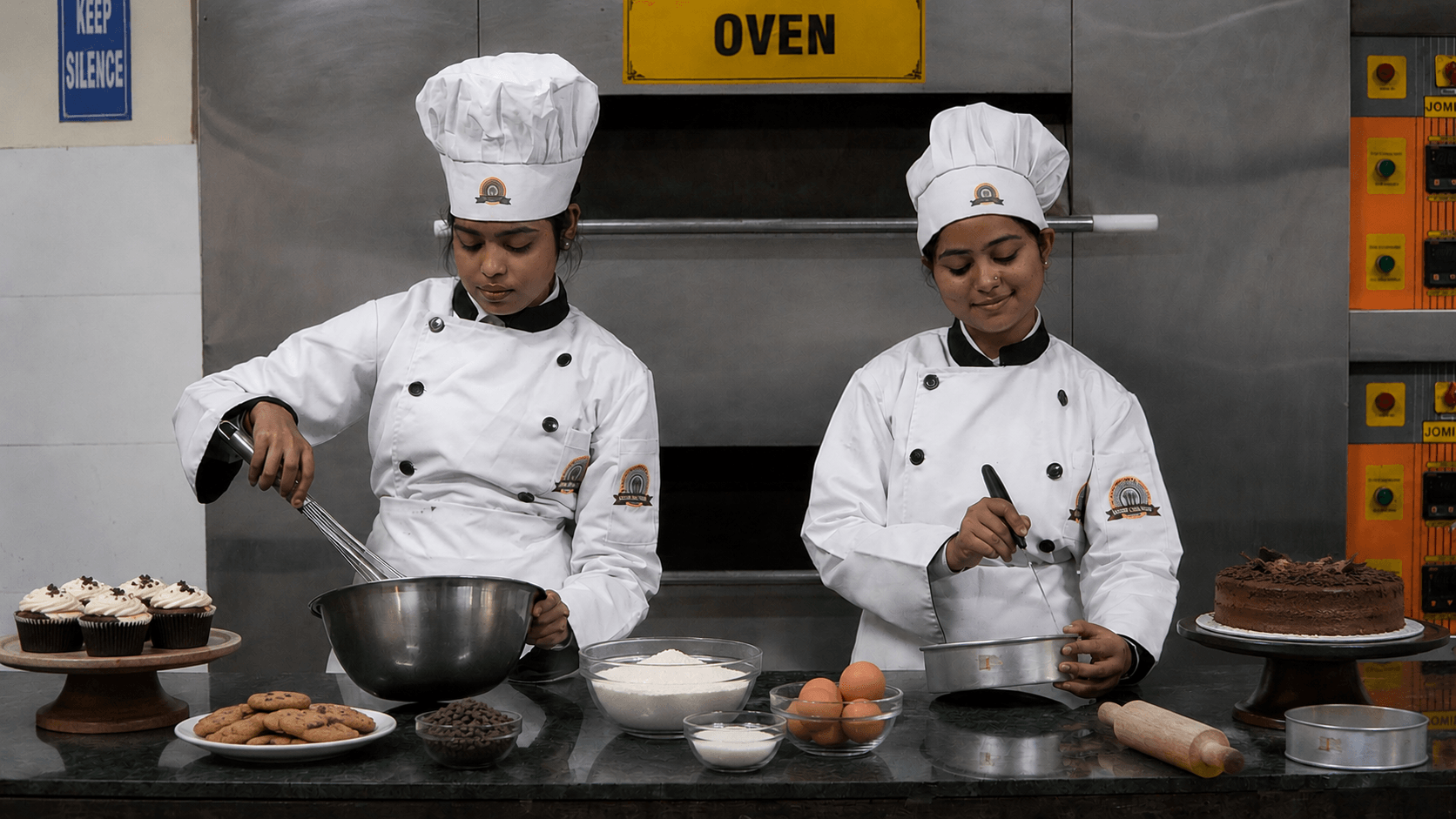 Gourmet fruit tarts and pastries in a professional bakery display